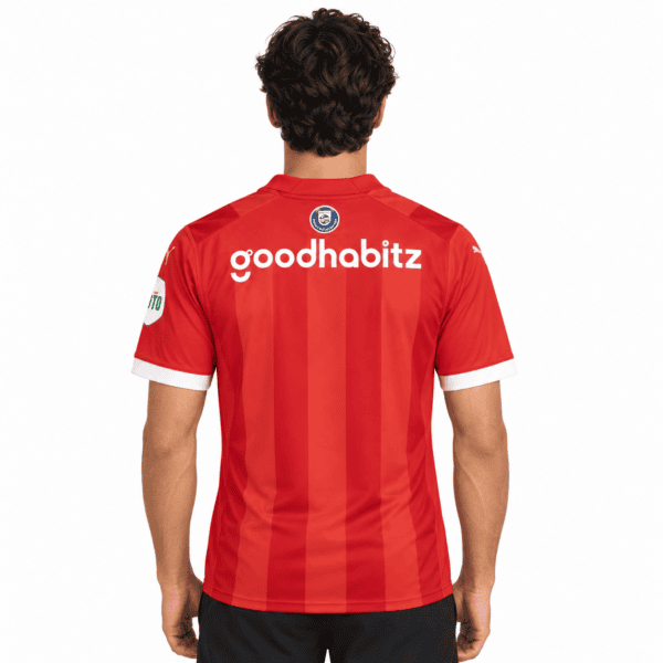 PSV Eindhoven home football kit 23/24 season red with white accents.