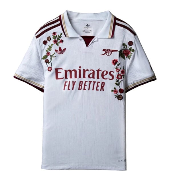 9d458bf8-0b7c-4d69-9501-f5540168d974jpg - UAE SPORT STORE Real Madrid away football jersey with floral design and Emirates sponsor logo.