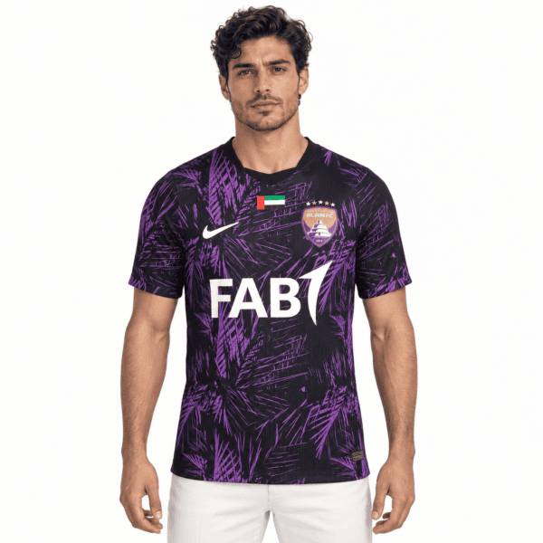 9eb6bbdd-6973-4d29-8c28-474c16f61809 - UAE SPORT STORE Al Ain FC away football jersey with purple and black pattern, FAB1 sponsor logo.