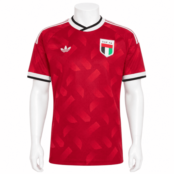 Capture - UAE SPORT STORE UAE national team away jersey with red camouflage pattern, UAE FA badge, and Adidas logo.