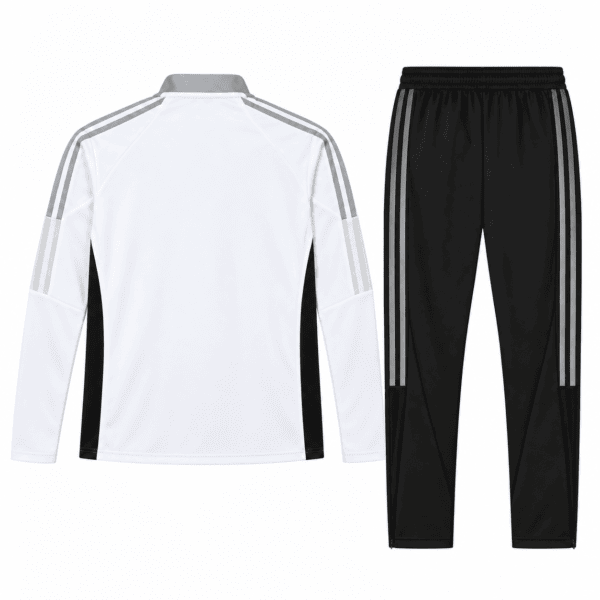 Juventus white and grey striped tracksuit with black pants and white top.