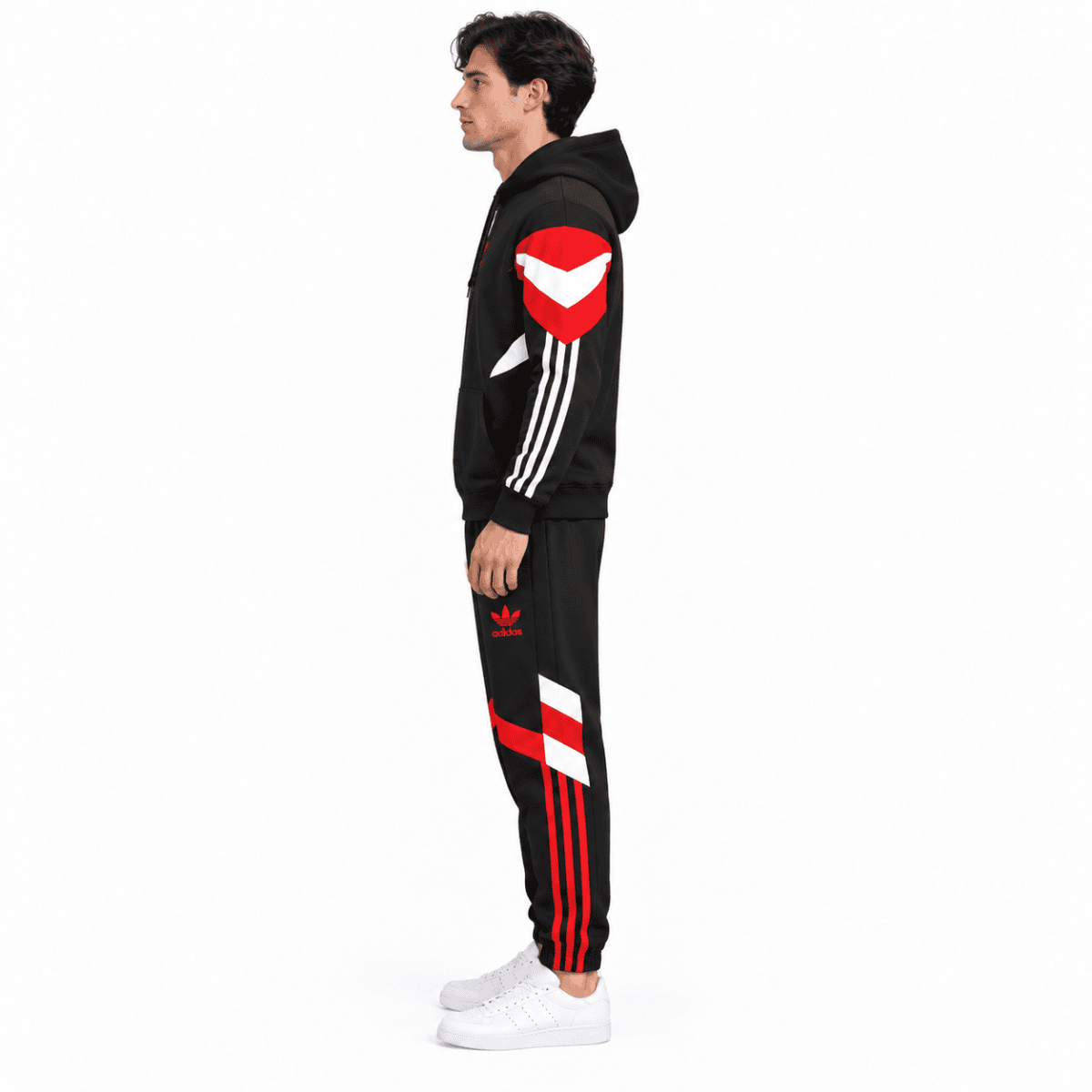 Man United hoodie tracksuit in black with red and white accents, full body side view.