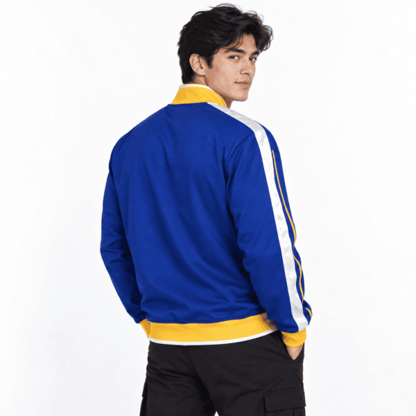 Man wearing Brazil long sleeve special blue/yellow football jersey, back view.