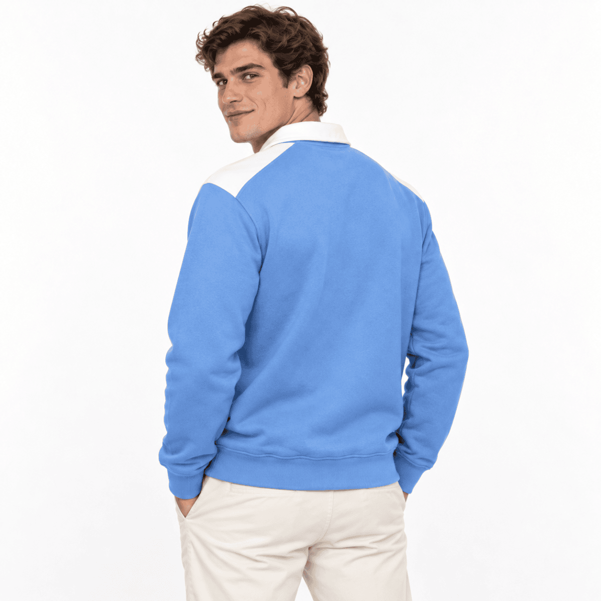 Man wearing a blue and white long-sleeve polo shirt, facing away.