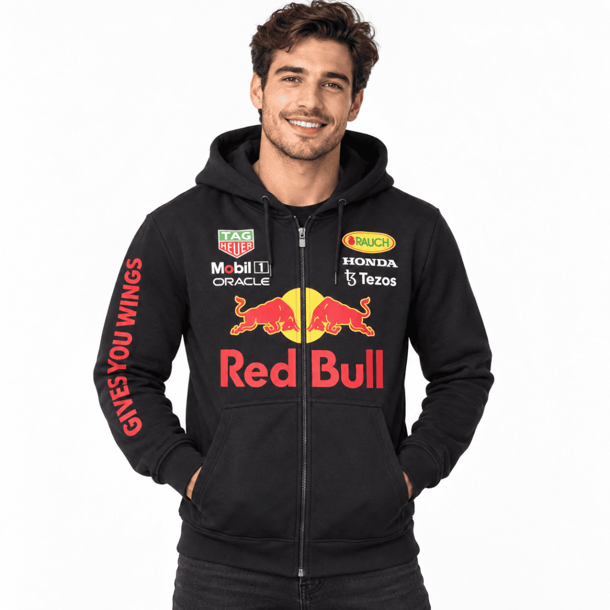 Man wearing Black Red Bull hoodie with sponsor logos and Red Bull logo.