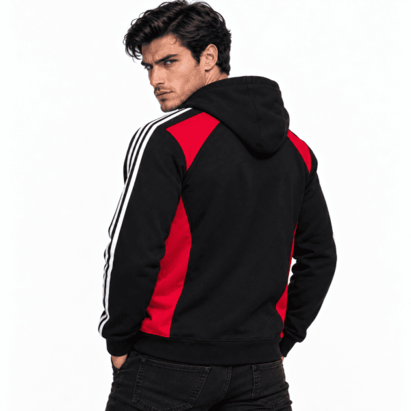 Male model wearing black and red hoodie with white stripes on sleeves.