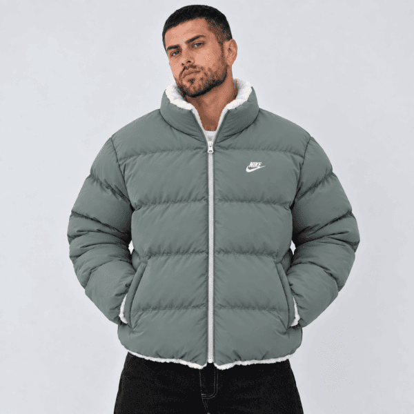 ChatGPT Image Sep 23 2026 07_17_51 PM 1 - UAE SPORT STORE Men's grey Nike puffer jacket with white fleece lining and logo.