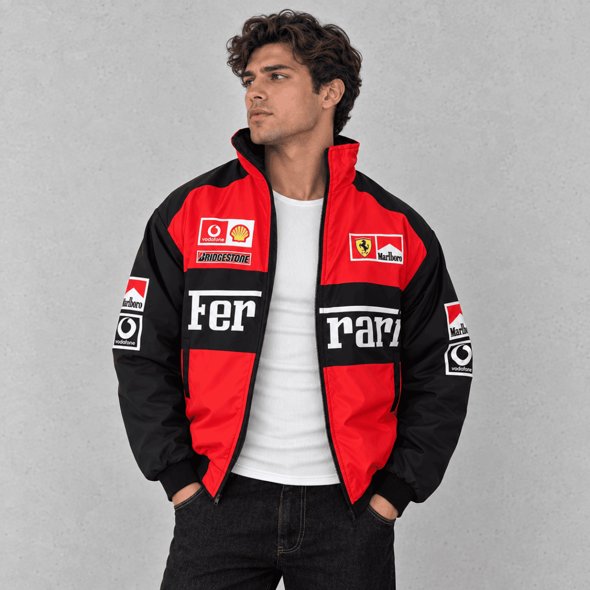 Ferrari Formula 1 team jacket with sponsor logos in red, black, and white colors.
