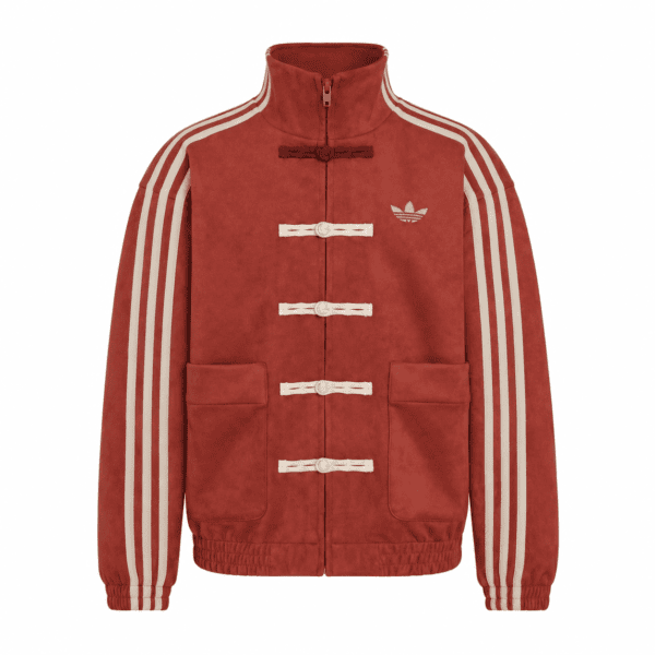 a8556669-78ee-4a72-8792-9501d17ebdb7 - UAE SPORT STORE Red Adidas track jacket with white stripes and front pockets.