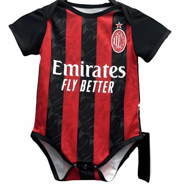 AC Milan baby kit with red and black vertical stripes, club crest, and sponsor logo.