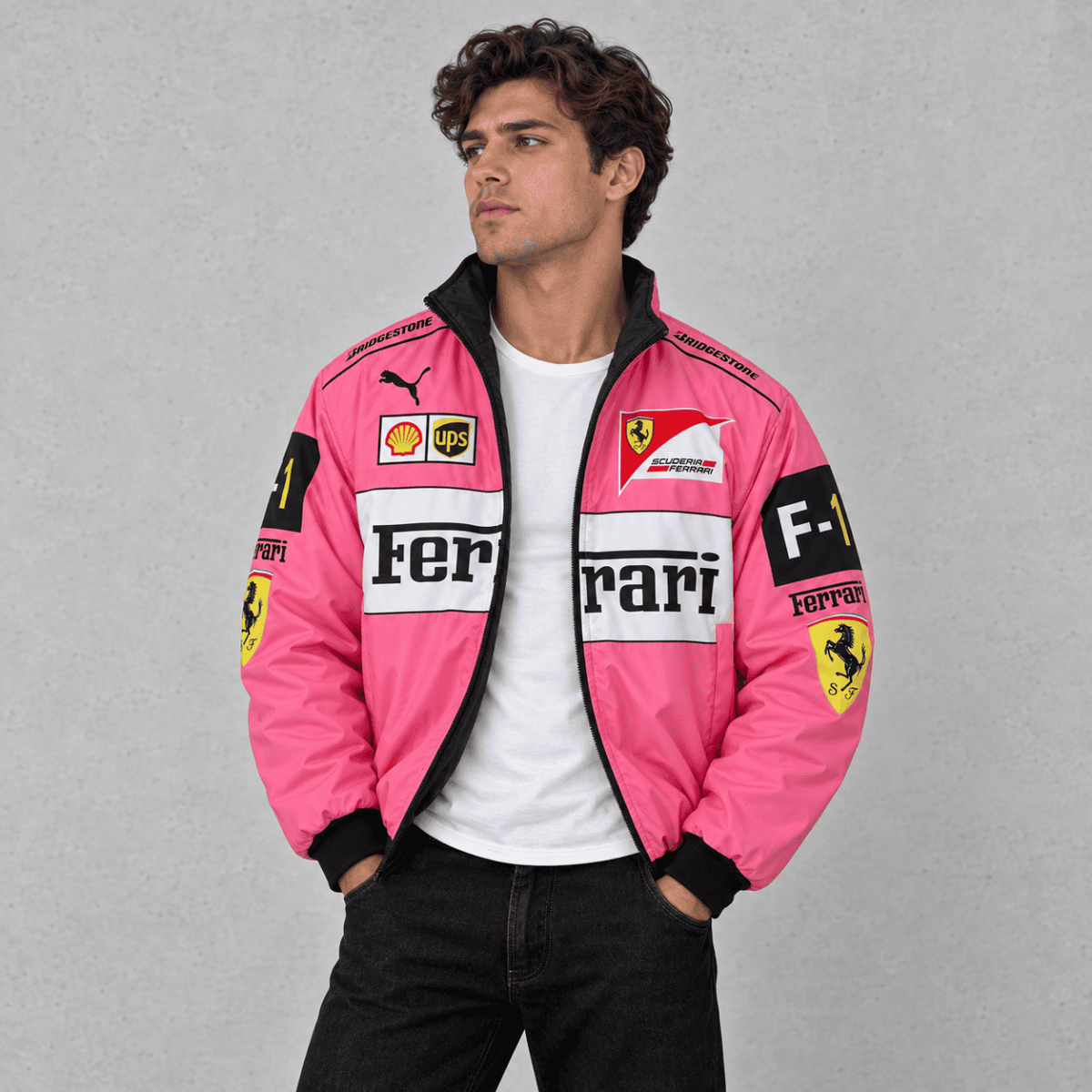 Man wearing pink Ferrari Formula 1 team jacket with sponsor logos.