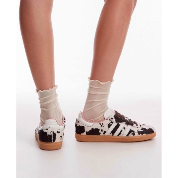 adidas Samba OG Cow Print sneakers worn back view with pink heel trim