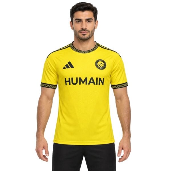 Al-Nassr Home Jersey 202627 yellow shirt front view with club crest - UAE SPORT STORE Al-Nassr Home Jersey 2026/27 yellow shirt front view with club crest