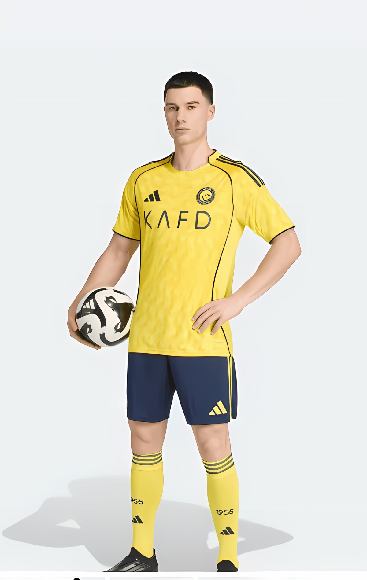 Yellow football kit with black Adidas stripes, shorts, and socks, man holding a ball.