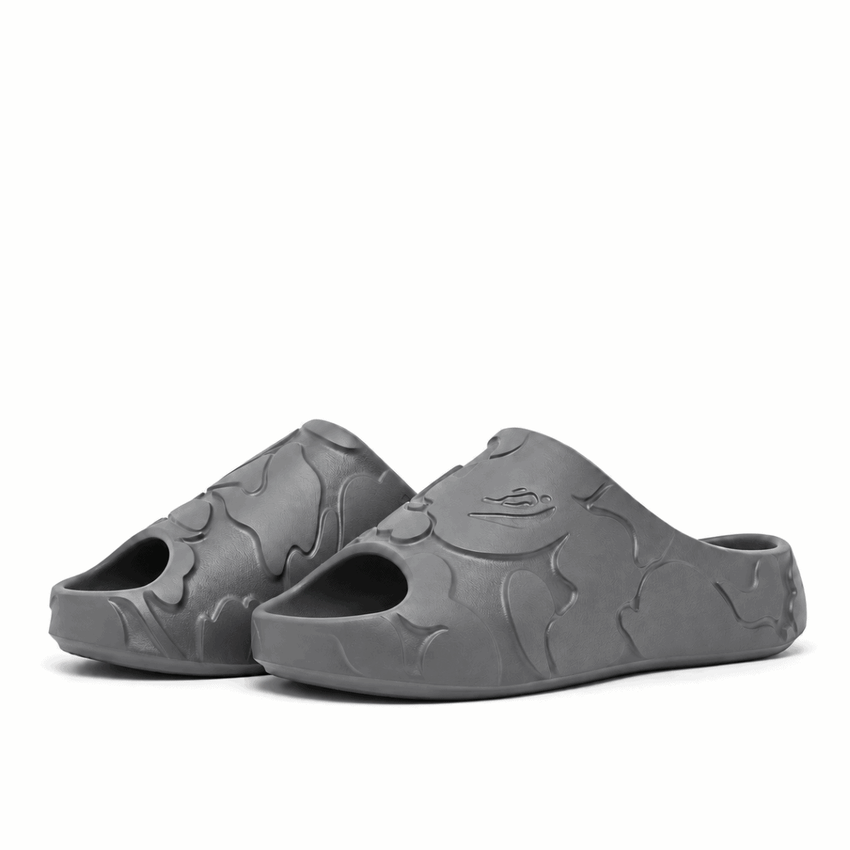 Grey Bape Slides with camouflage pattern on a white background.