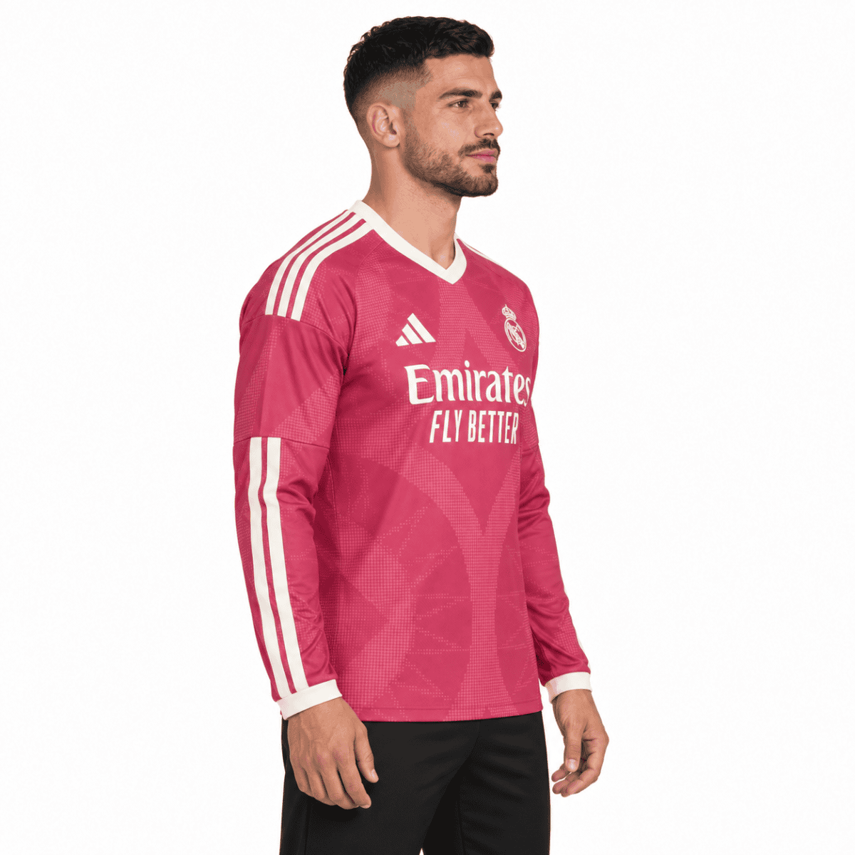 Real Madrid away kit jersey with pink and white colors, season not specified.