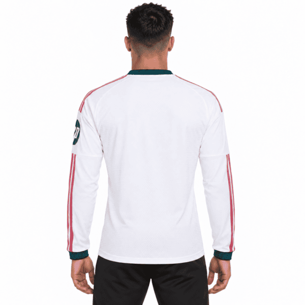 Real Madrid home long sleeve jersey 2026/27, white with red and green accents.