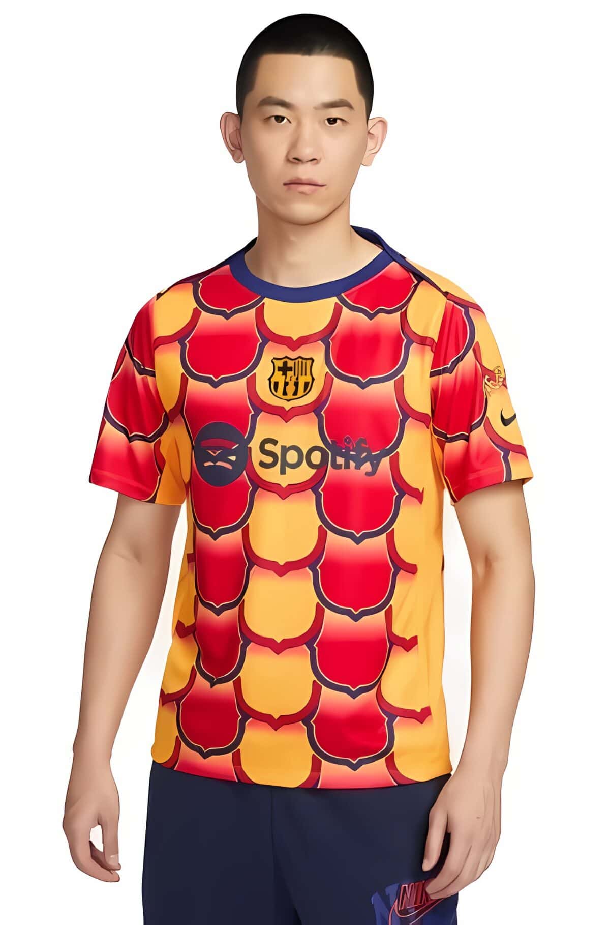 FC Barcelona away jersey with red and yellow pattern, season not specified.