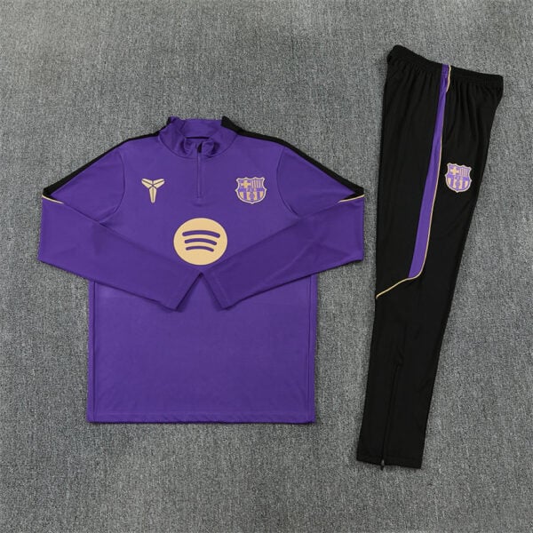Barcelona purple tracksuit 2026/27 flat lay full set top and tapered black joggers