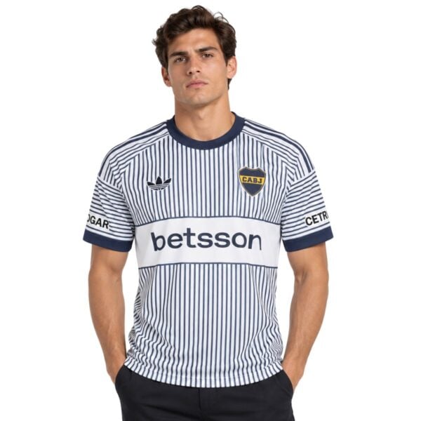 Boca Juniors Away Jersey 202627 front white shirt with navy pinstripes and Betsson chest band - UAE SPORT STORE Boca Juniors Away Jersey 2026/27 front – white shirt with navy pinstripes and Betsson chest band