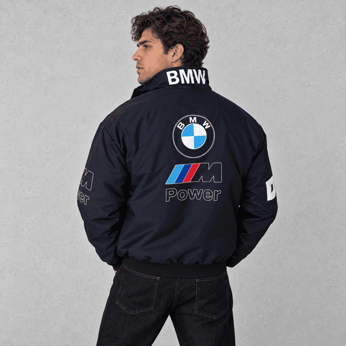 BMW M Power logo on a black BMW racing jacket with BMW logo on the back.