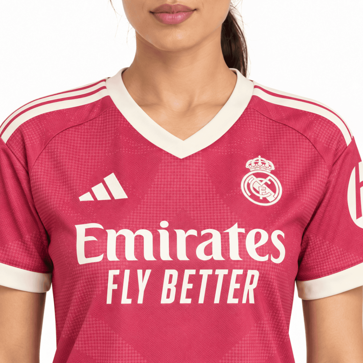 Real Madrid home jersey 2023-24 season pink and white kit with club crest.