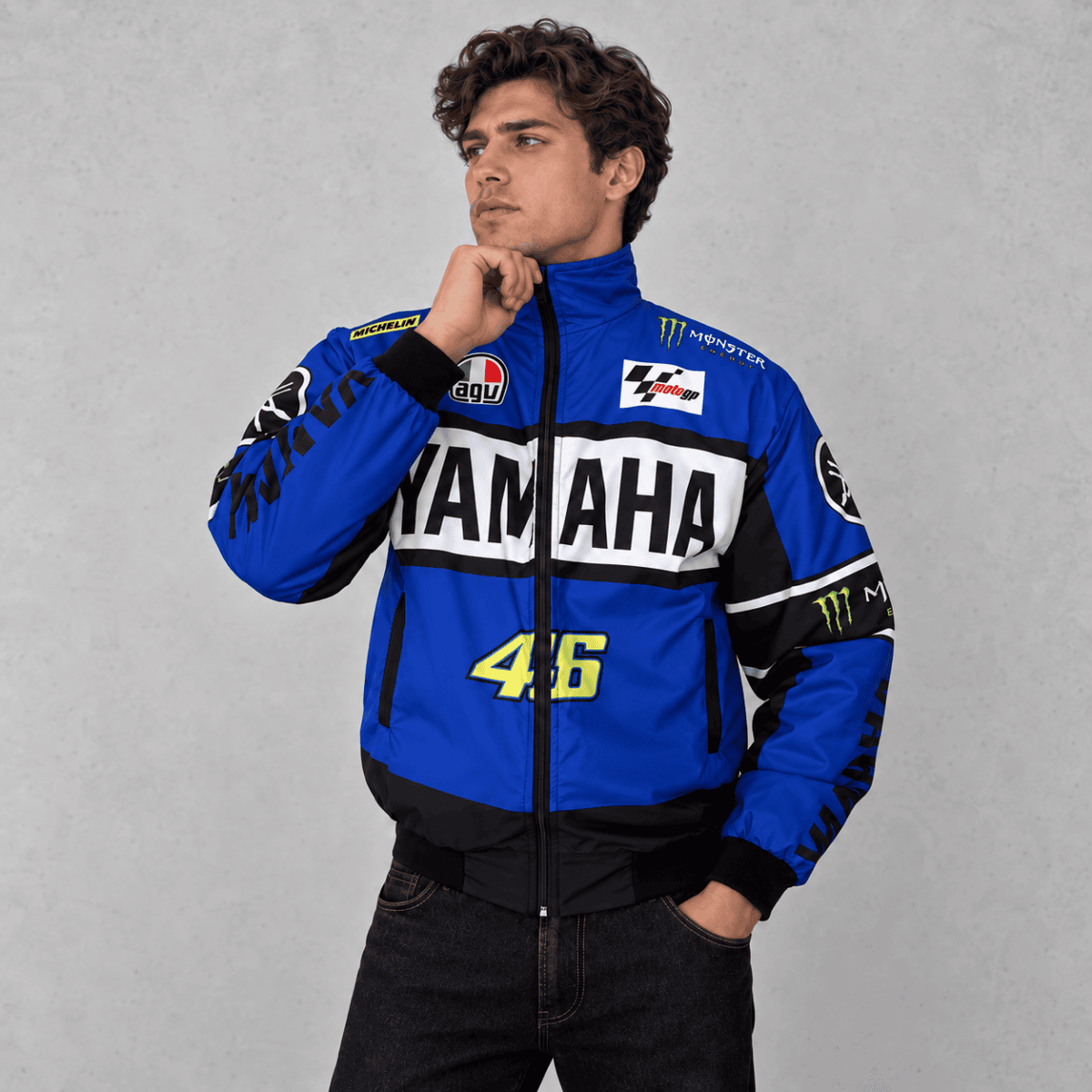 Yamaha MotoGP racing jacket in blue, black, and white with sponsor logos.