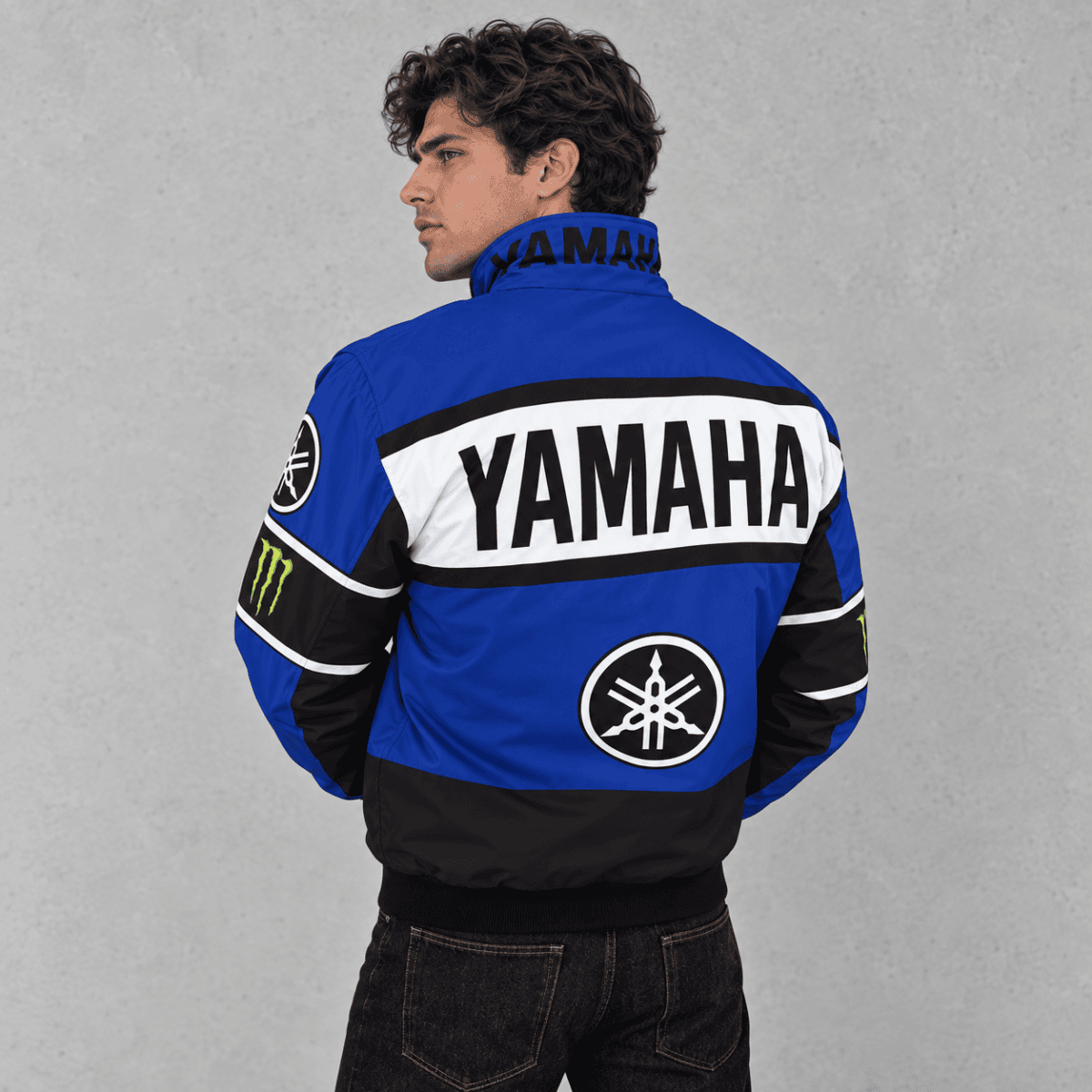 Yamaha racing jacket in blue, black, and white with Yamaha logo and branding.