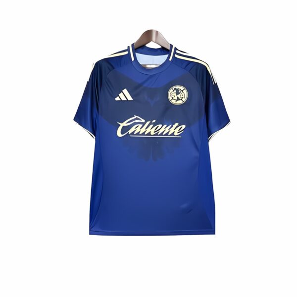 Blue football jersey with white Adidas stripes and club crest, Caliente sponsor.