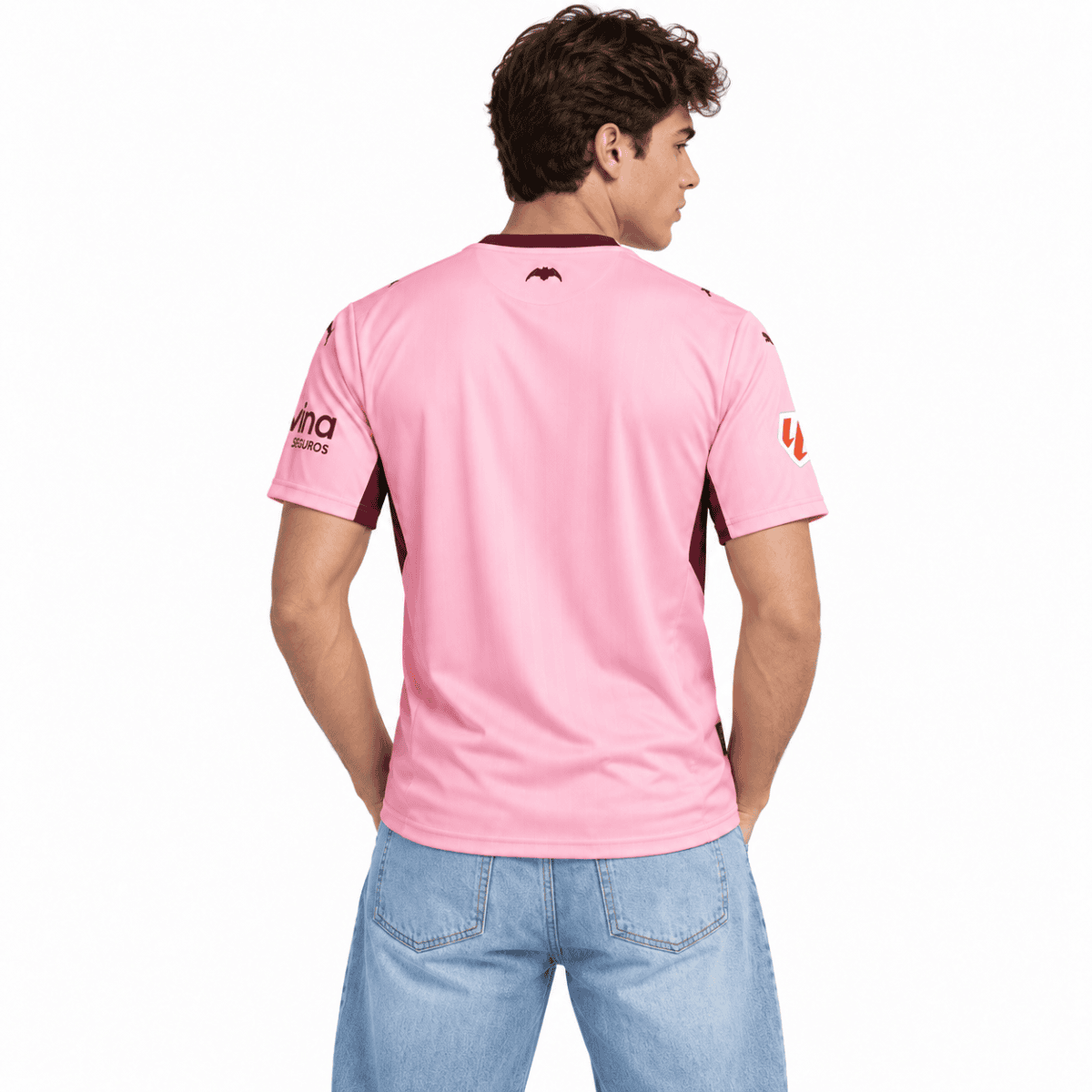Valencia third jersey 2026/27 in pink with black accents, back view.
