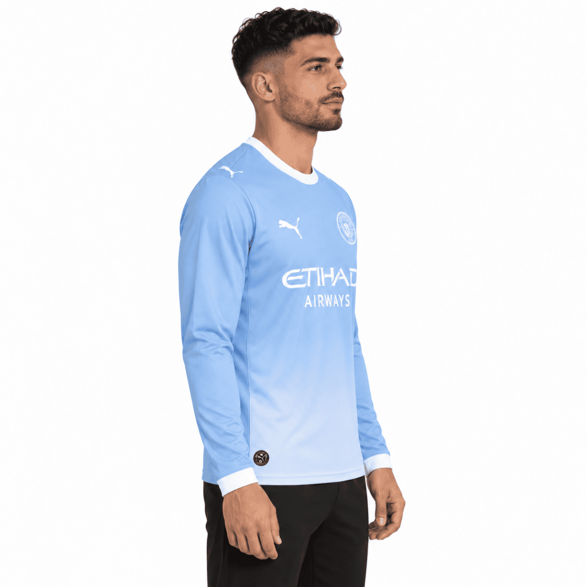 Manchester City long sleeve home jersey 2026/27 season in light blue with white accents.