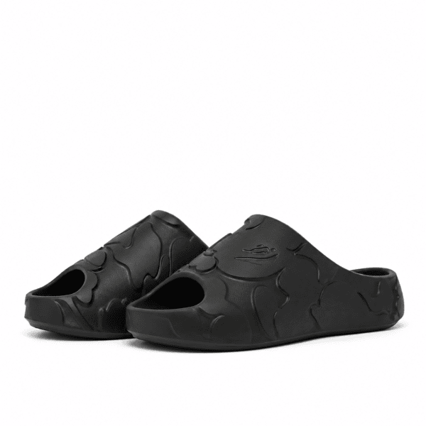 Black Bape Slides with embossed logo and textured design.