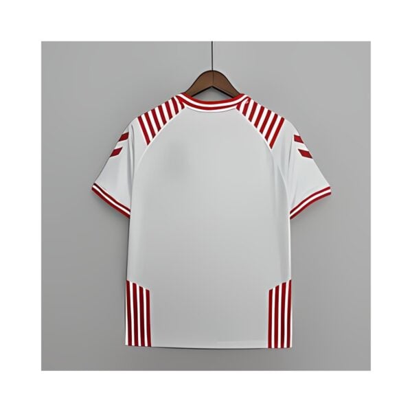 White football jersey with red stripes on shoulders and sides.