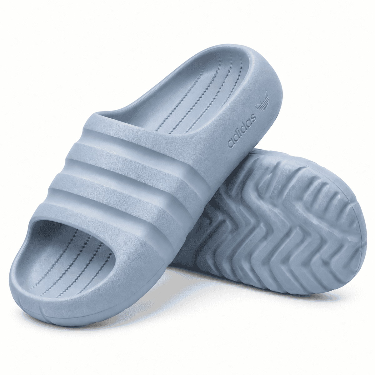 Light blue Adidas Adilette Ayoon Slides with three stripes and textured sole.