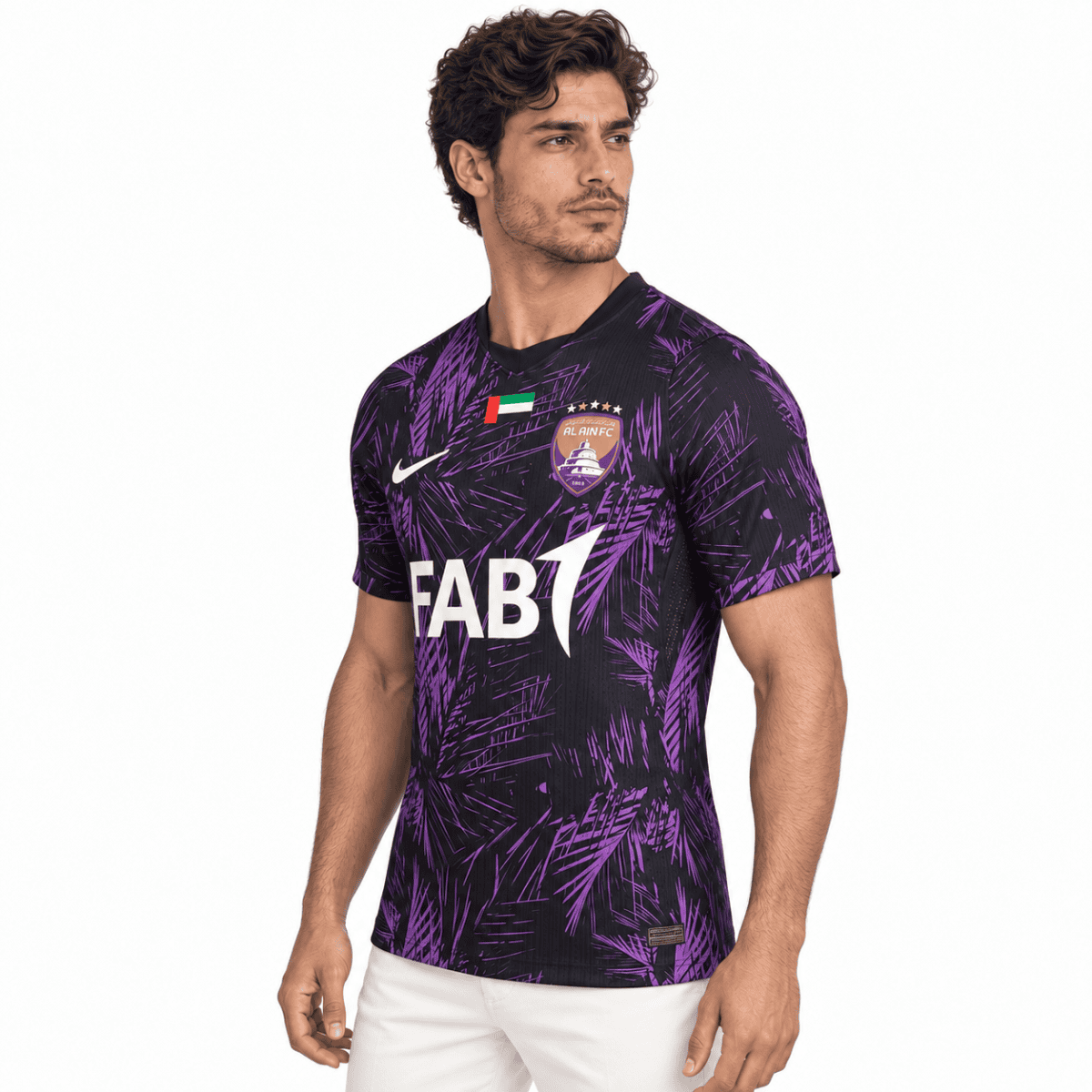 Al Ain FC football jersey with purple and black design, club crest, and sponsor logo.