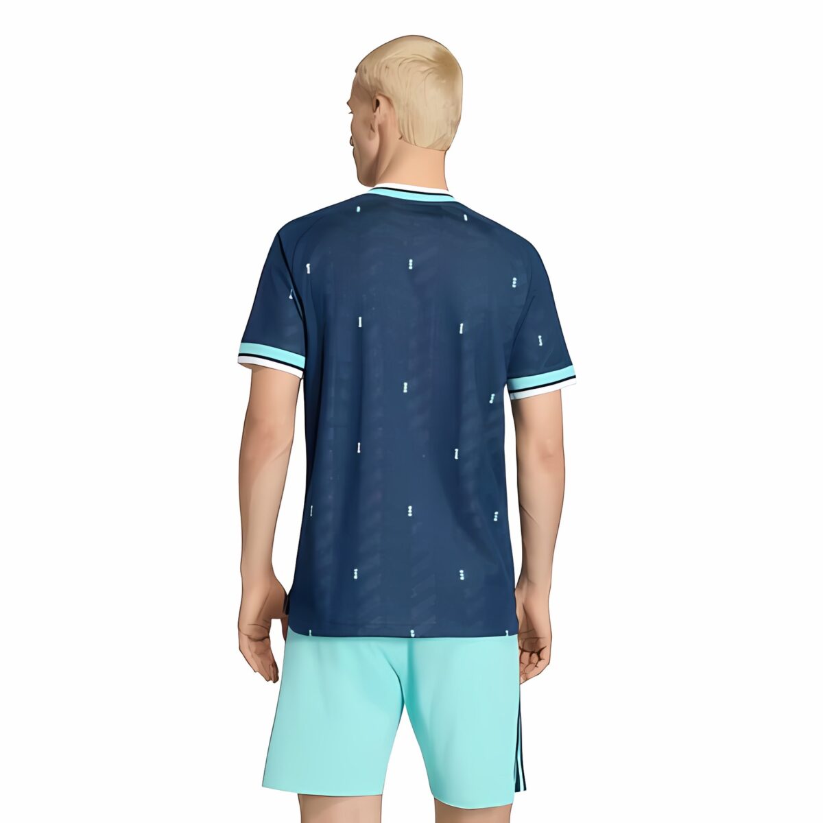 Man wearing a blue football jersey and light blue shorts, back view.