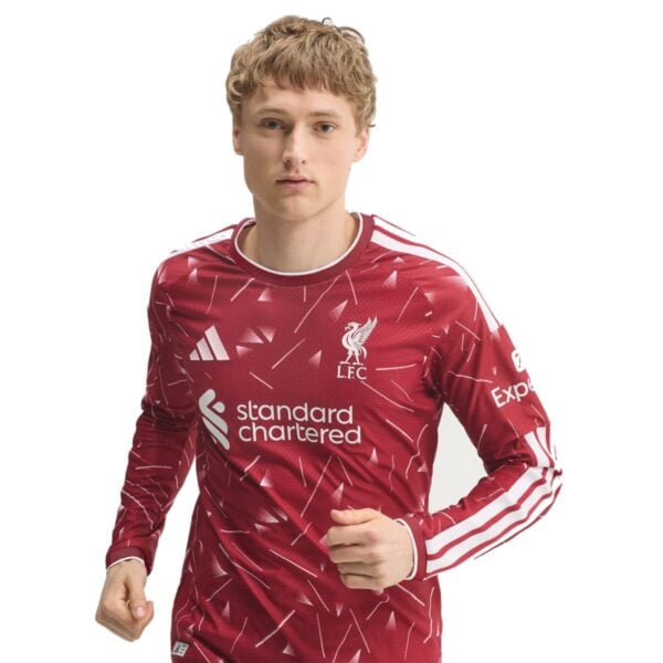 Liverpool Home Long Sleeve Jersey 202627 front view on model red with white geometric print - UAE SPORT STORE Liverpool Home Long Sleeve Jersey 2026/27 front view on model – red with white geometric print
