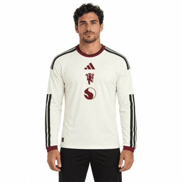 Manchester United Third Long Sleeve Jersey 202627 off-white front view with club crest - UAE SPORT STORE Manchester United Third Long Sleeve Jersey 2026/27 off-white front view with club crest
