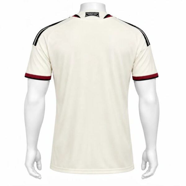Manchester United Third Player Version Jersey 2026/27 back view in cream with black shoulder stripes