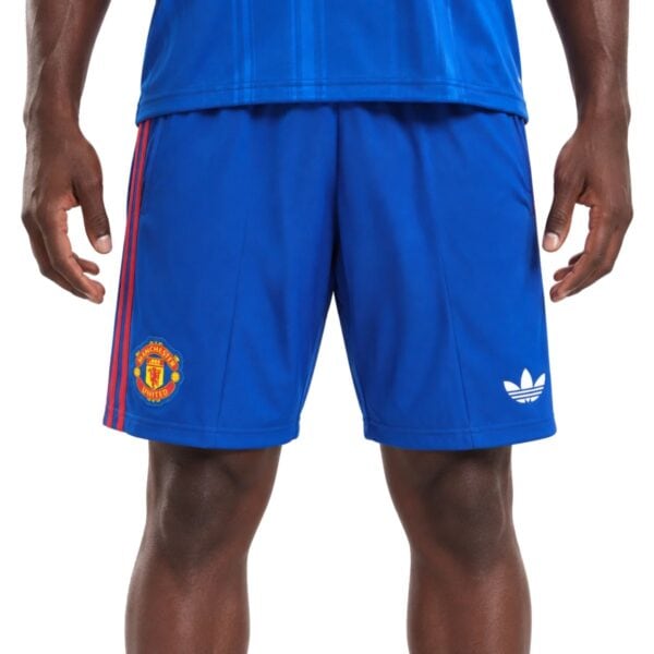 Manchester United Away Short 202627 blue shorts front view with club crest - UAE SPORT STORE Manchester United Away Short 2026/27 blue shorts front view with club crest