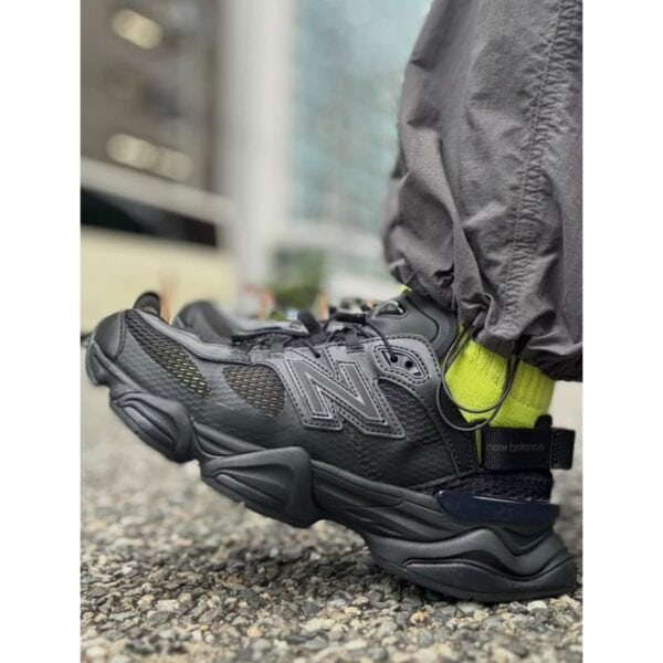 New Balance 9060 Summer Triple Black sneaker worn side view