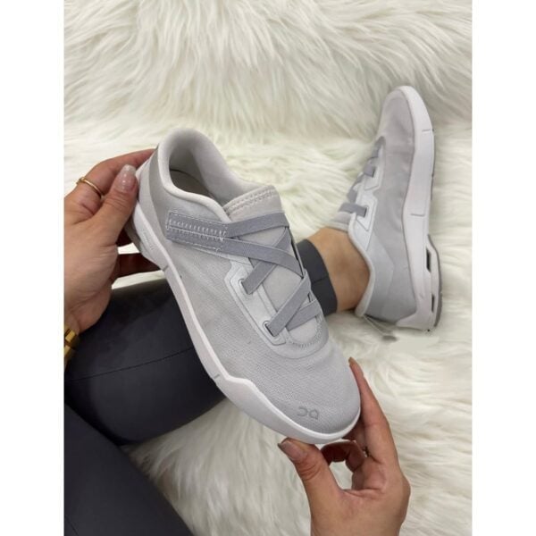 On Running Cloudnova Moon Glacier Grey sneaker held in hand - UAE SPORT STORE On Running Cloudnova Moon Glacier Grey sneaker held in hand