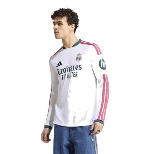 Real Madrid Home Long Sleeve Jersey 2026/27 front view – white with pink sleeve stripes - UAE SPORT STORE Real Madrid Home Long Sleeve Jersey 2026/27 front view – white with pink sleeve stripes