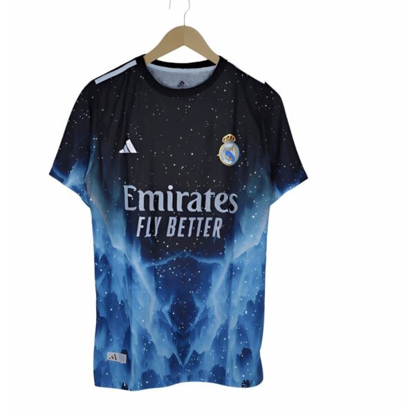 Real Madrid away kit jersey with blue and black galaxy design and Emirates logo.