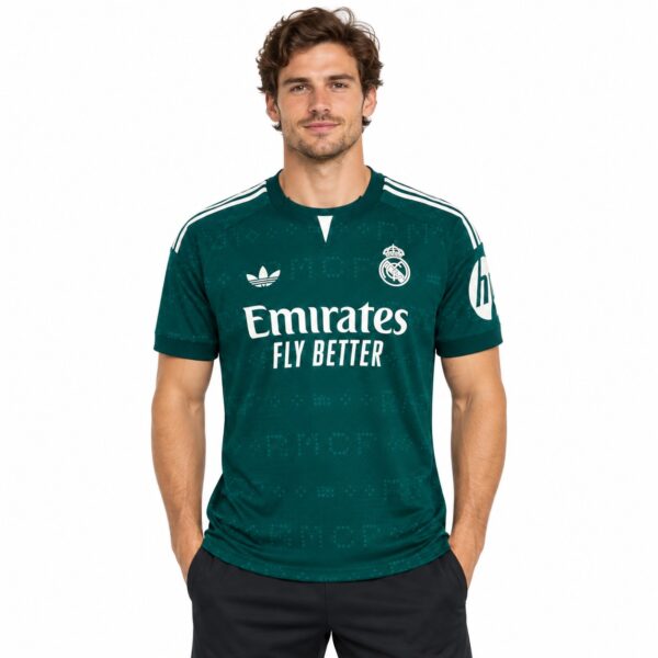 rm-away-player-2026-27-1 - UAE SPORT STORE Real Madrid 2023 home football jersey in dark green with white accents.