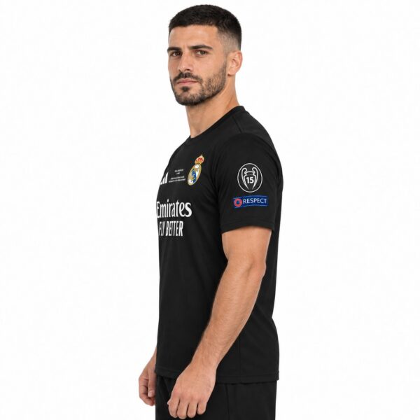 Real Madrid away football jersey black with club crest and sponsor logo.