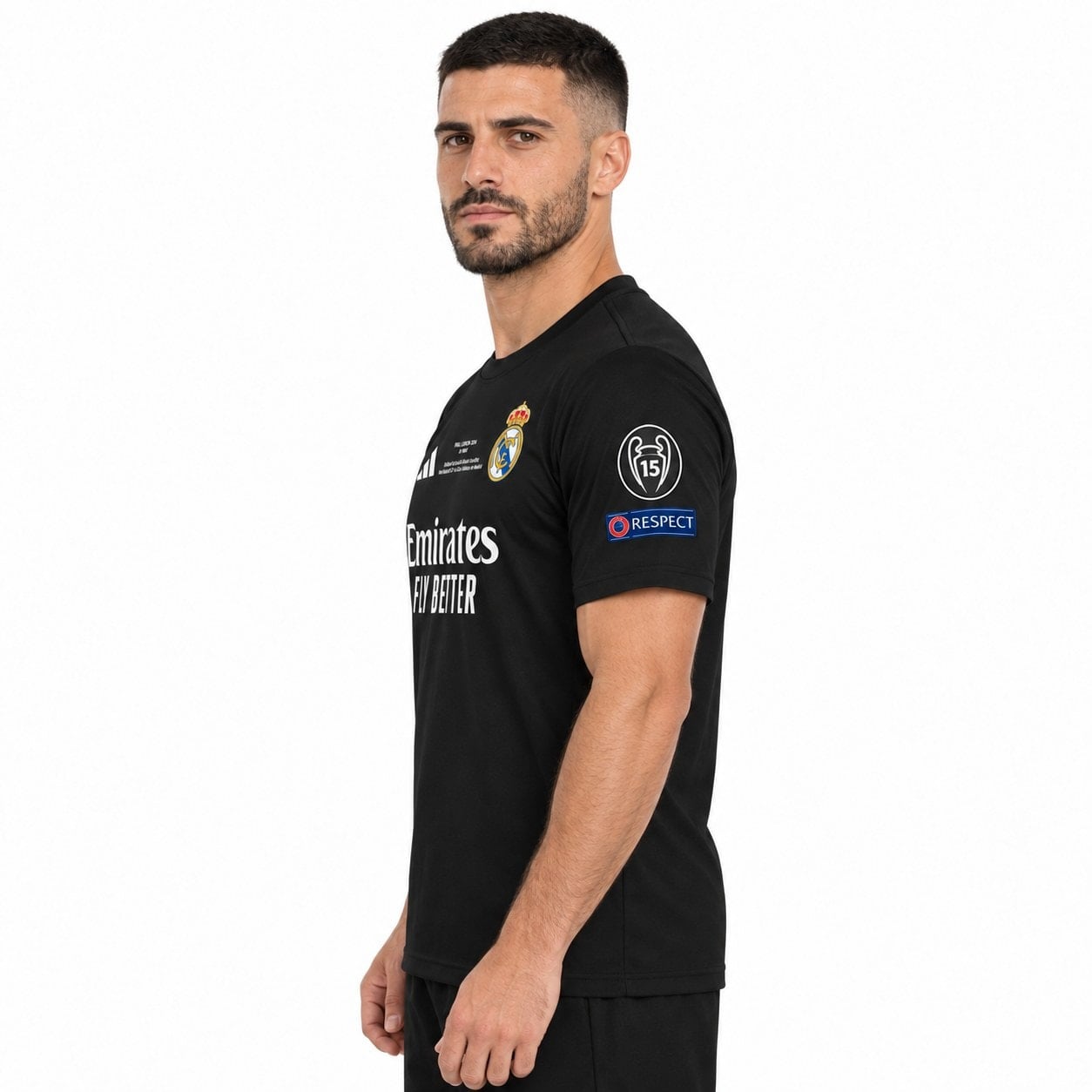 rm-black-special-edition-2 - UAE SPORT STORE Model front-quarter view of a black Real Madrid shirt with white chest lettering.