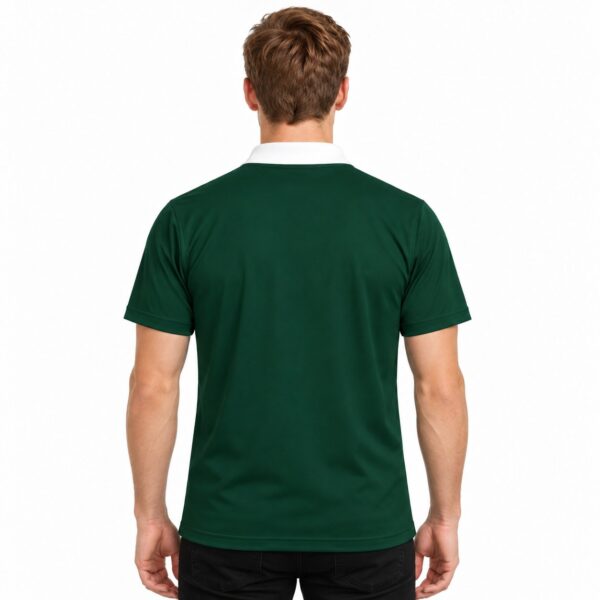 Back view of a man wearing a green football jersey with white collar.