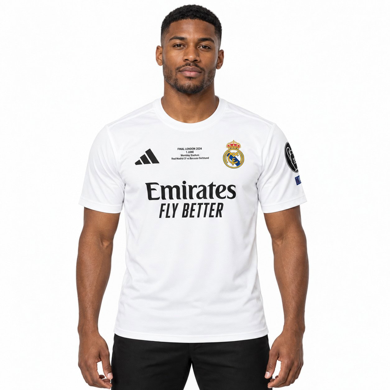 rm-fc-white-shirt-1 - UAE SPORT STORE Model wearing the white Real Madrid shirt, front view with crest, black Emirates lettering, small chest inscription and sleeve badges.