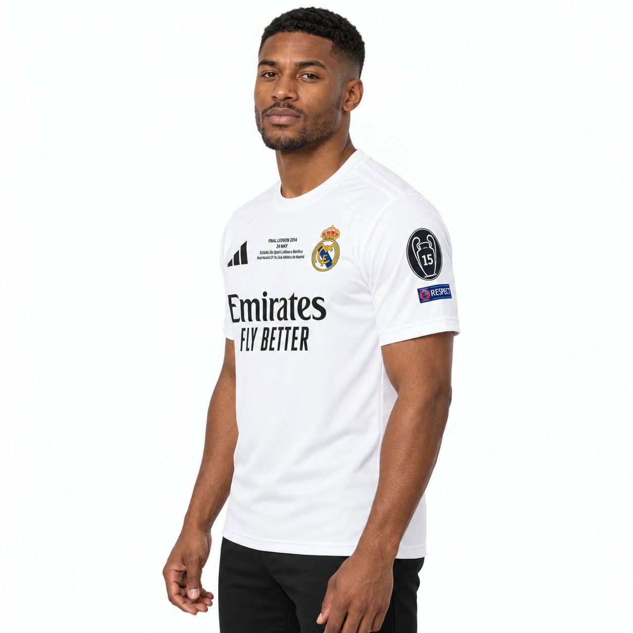 rm-fc-white-shirt-3 - UAE SPORT STORE Three-quarter front view of the white Real Madrid shirt with crest, black Emirates lettering and sleeve badges.